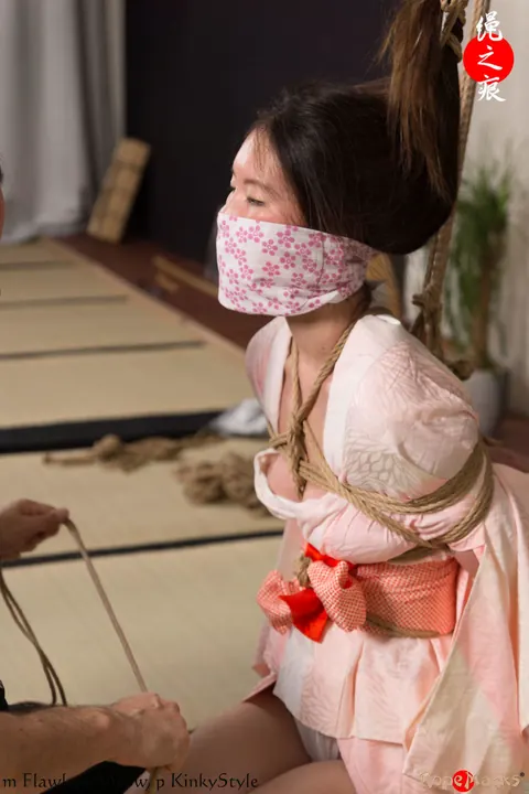 Asian Brunette Restrained by Rope on Limbs and Hair – photo 2 of 16