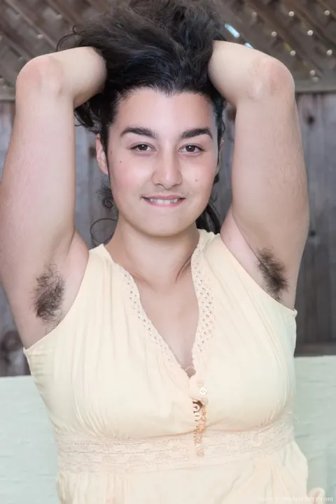 Hairy Woman Spreads Her Bush and Shows Her Armpits Outdoors – photo 5 of 17