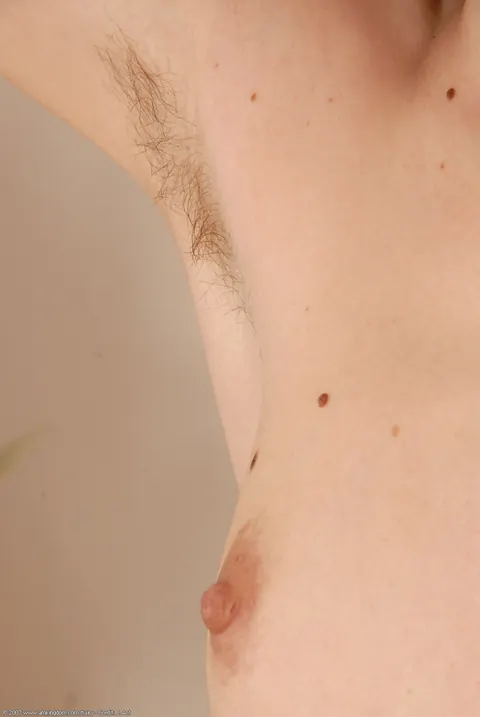 Redhead with Piercings Spreads Her Hairy Pussy – photo 16 of 21