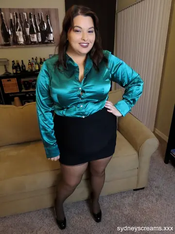 Sydney Screams – Curvy Brunette MILF Strips Out of Her Skirt and Pantyhose