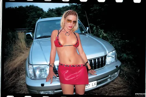 Tiffany Rouge: Blonde MILF in a Bikini and Latex Takes Two Men Outdoors – photo 1 of 12