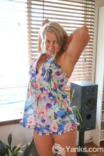 Mature Blonde with Big Tits Strips Out of Her Dress and Bra