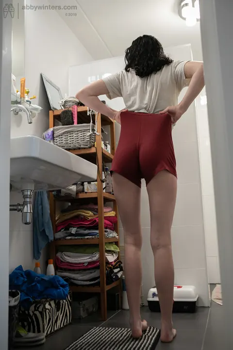 Curly Australian Brunette Shows Her Hairy Bush in the Bathroom – photo 14 of 20