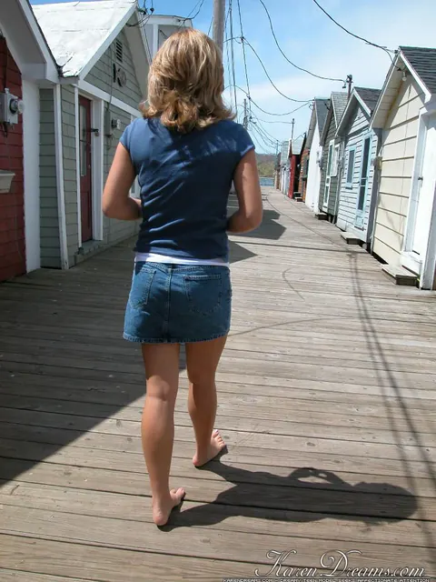 Woman Flashes Her Panties and Spreads Her Legs on a Pier – photo 12 of 12