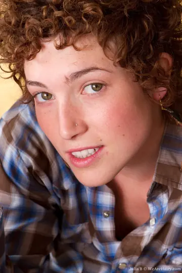 Short-Haired Curly Woman in a Bikini Reveals Her Hairy Bush and Armpits