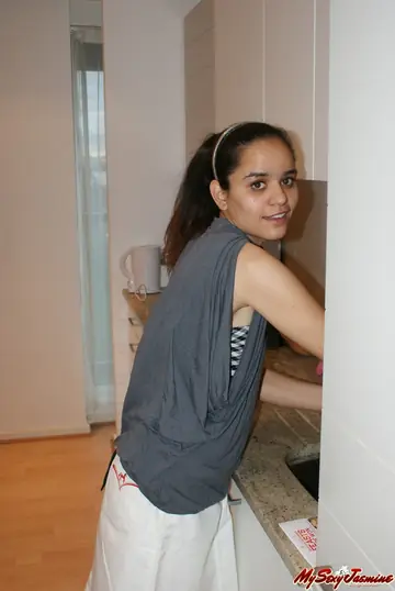 Indian Brunette Unleashes Her Small Natural Tits in the Kitchen
