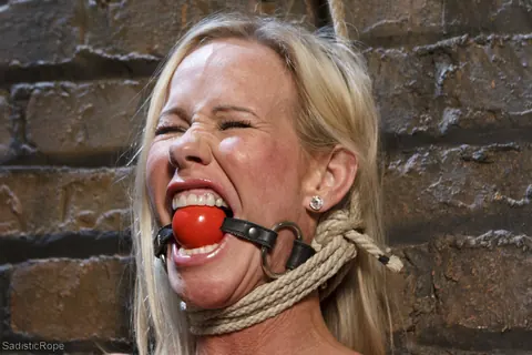 Simone Sonay: Blonde MILF in Rope Bondage Shows Her Enhanced Tits and Ink – photo 2 of 21