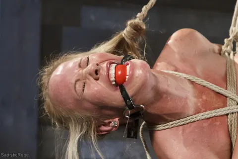 Simone Sonay: Blonde MILF in Rope Bondage Shows Her Enhanced Tits and Ink – photo 15 of 21