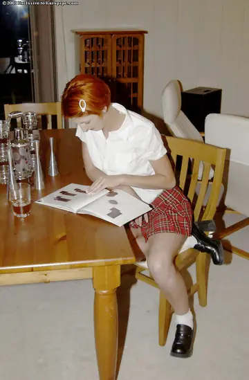 Redhead with Short Hair Strips and Fingers in the Kitchen