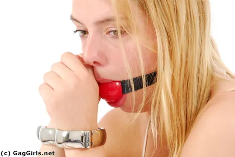 Blonde in a Bikini and Heels Locks Herself in Steel Cuffs – photo 10 of 16