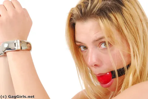Blonde in a Bikini and Heels Locks Herself in Steel Cuffs – photo 9 of 16