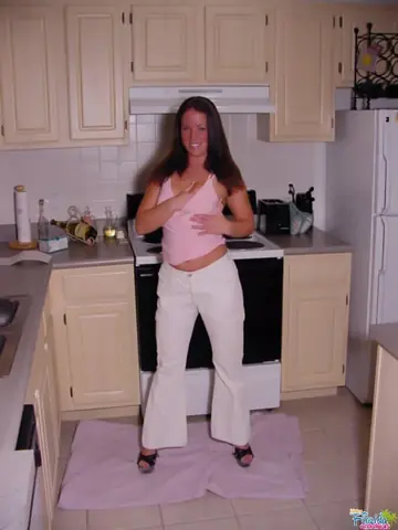 Busty Brunette Pisses in High Heels in the Kitchen