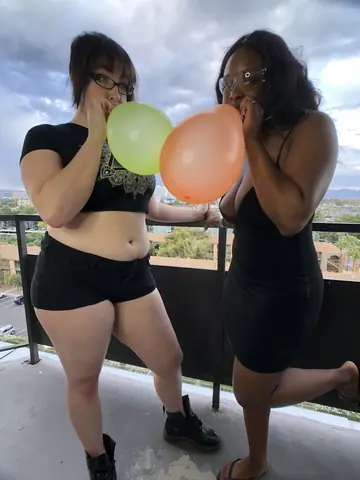Busty Ebony MILF Poses in Glasses Outdoors