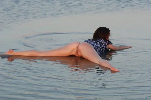 Nadin A: Tattooed Brunette Spreads Her Shaved Pussy on the Beach – photo 20 of 21