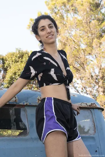 Sofia H – Thick Redhead Poses Nude on an Old Truck and Spreads Her Hairy Crotch