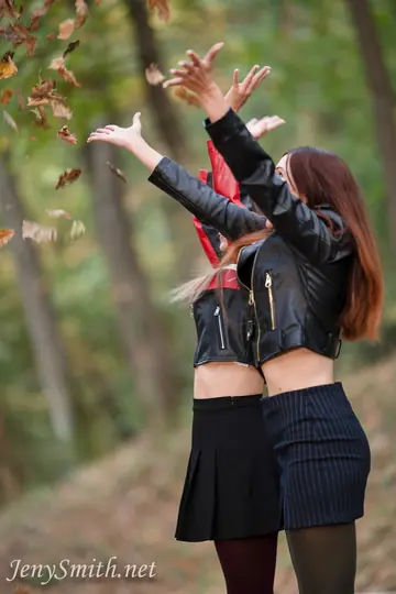 Brunette Lesbians Lick and Finger in Leather Skirts Outdoors