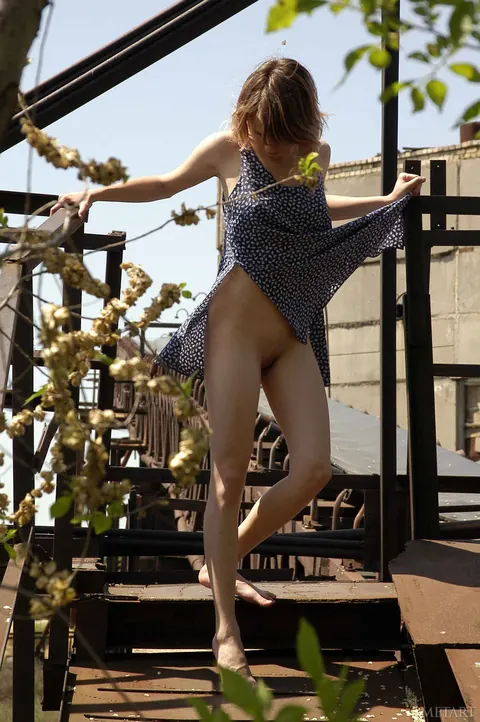 Woman Strips Nude and Spreads Her Legs on the Grass – photo 4 of 21