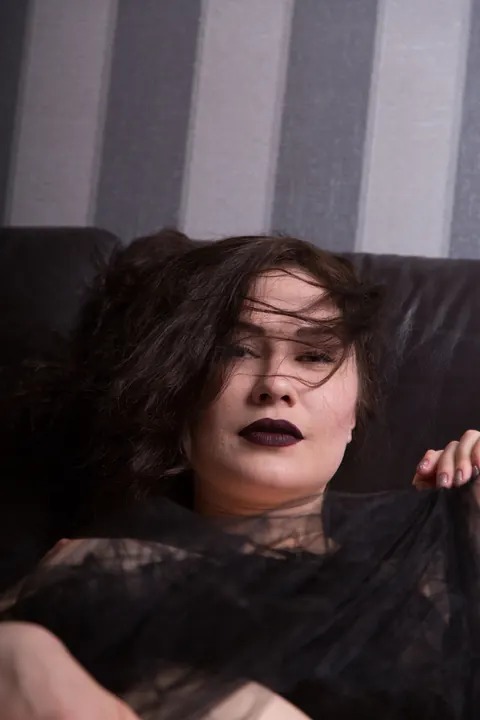 Judith Able: Two Busty Brunettes in Stockings Kiss and Spread on the Sofa – photo 12 of 17