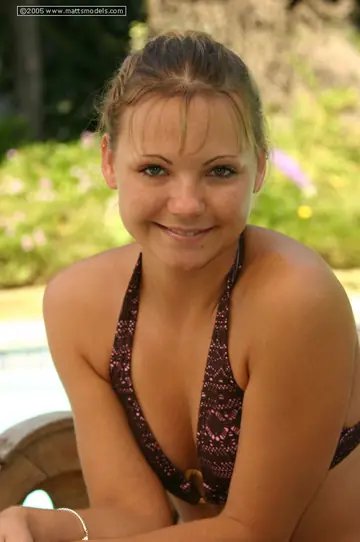 Brunette MILF Smokes and Strips Out of Her Bikini Outdoors