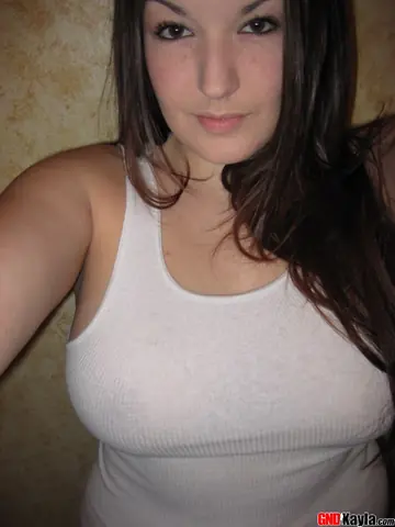 Tattooed Amateur Brunette Strips and Spreads for Selfies