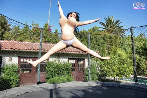 Leanne Crow: European Brunette Jumps on Trampoline with Big Natural Tits – photo 9 of 14