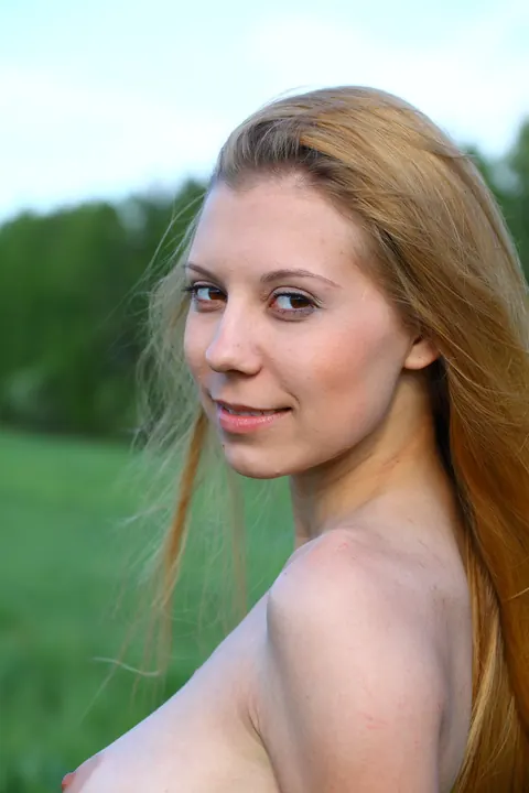 Skinny Redhead with Big Tits Strips Out of Her Jeans Outdoors – photo 17 of 21