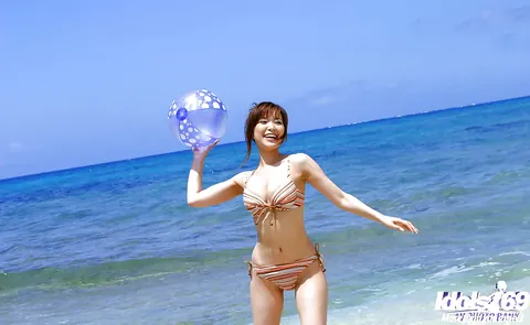 Yua Aida: Busty Japanese Brunette Strips Out of Her Bikini on the Beach – photo 2 of 16