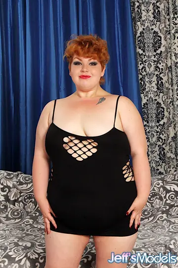 BBW Redhead with Big Tits Spreads Her Shaved Pussy