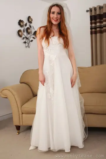 Slim British Redhead Strips Off Her Bridal Dress for Lingerie and Stockings