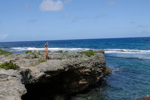 European Babe with Big Tits Oils Up and Strips on the Beach – photo 15 of 16