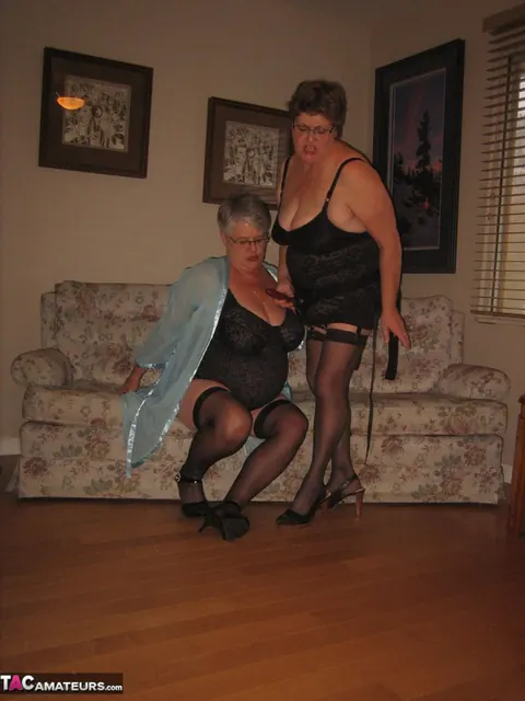 Mature Women in Stockings Share a Strap-On – photo 10 of 20