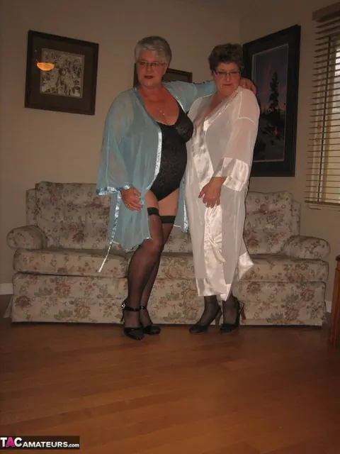 Mature Women in Stockings Share a Strap-On – photo 1 of 20