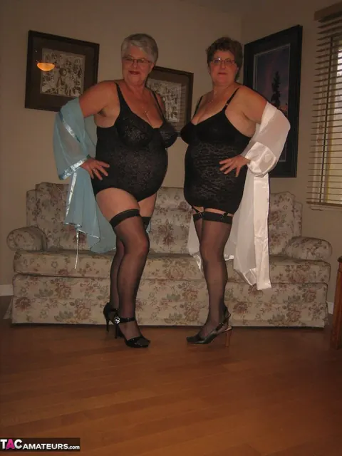 Mature Women in Stockings Share a Strap-On – photo 4 of 20