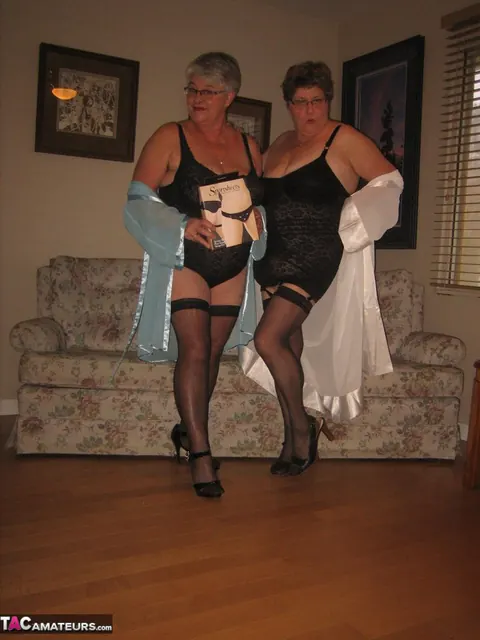 Mature Women in Stockings Share a Strap-On – photo 7 of 20