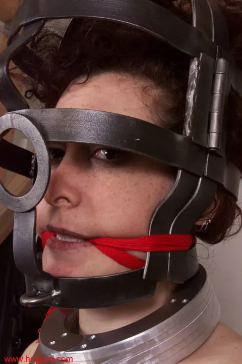 Brunette in Metal Bondage Spreads Her Pussy While Gagged – photo 2 of 8
