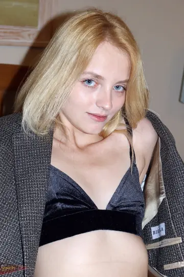Skinny Blonde in Stockings Fingers Her Shaved Slit