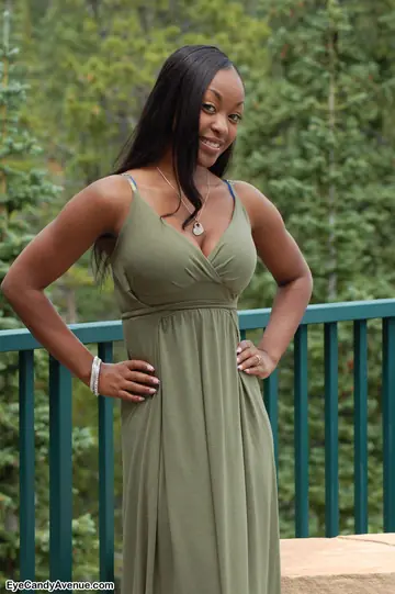 Ebony Woman Strips Off Her Dress and Shows Her Big Tits on the Balcony