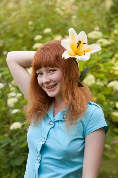 Redhead Poses Nude in the Garden Showing Her Hairy Bush – photo 18 of 20