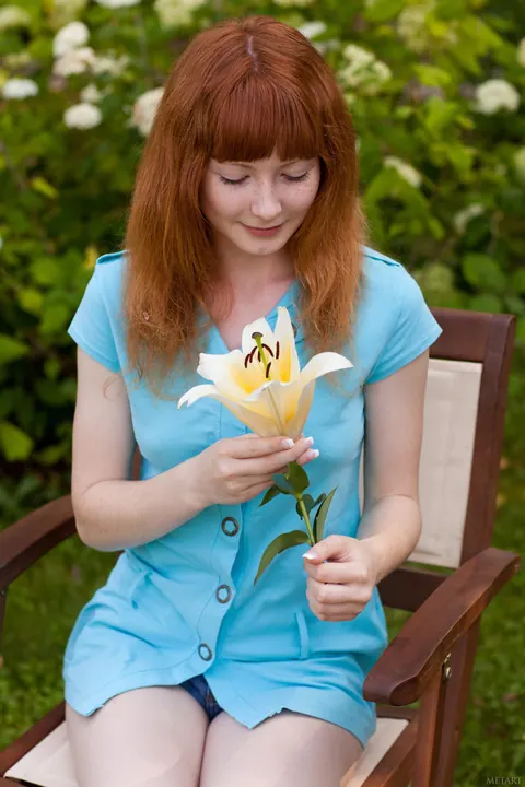 Redhead Poses Nude in the Garden Showing Her Hairy Bush – photo 15 of 20