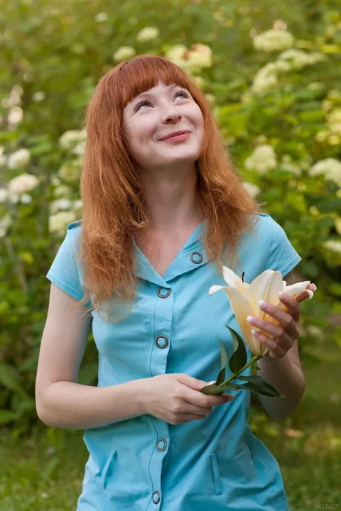 Redhead Poses Nude in the Garden Showing Her Hairy Bush – photo 20 of 20