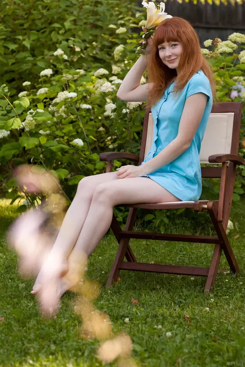 Redhead Poses Nude in the Garden Showing Her Hairy Bush – photo 16 of 20
