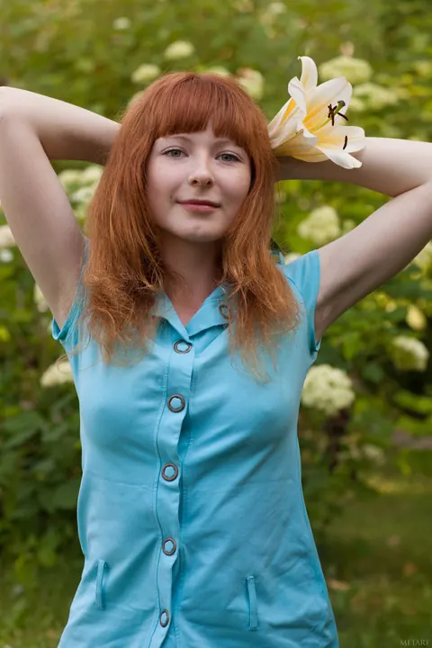 Redhead Poses Nude in the Garden Showing Her Hairy Bush – photo 19 of 20