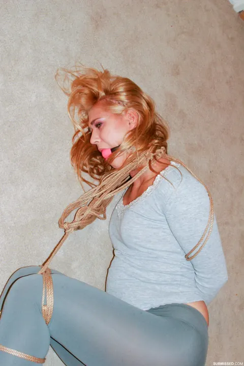 Linda Ray: Hungarian Blonde in Yoga Pants Fights Bondage Restraints – photo 8 of 21