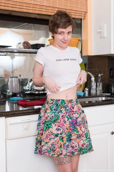 Mercy West: Slim Short-Haired Brunette Bares Her Hairy Bush in the Kitchen – photo 2 of 21