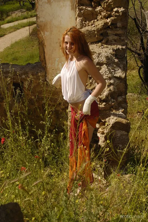 Redhead Poses in a Skirt Outdoors at Ruins – photo 1 of 16
