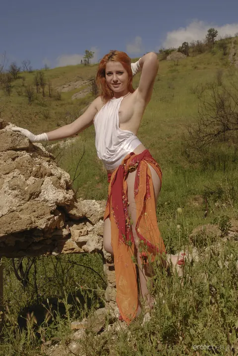 Redhead Poses in a Skirt Outdoors at Ruins – photo 5 of 16