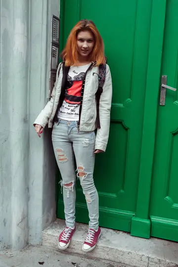 Skinny Woman Peels Off Her Outfit and Poses Nude