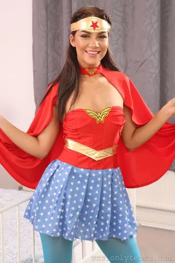 Slim Brunette Strips Out of Her Wonder Woman Costume and Pantyhose