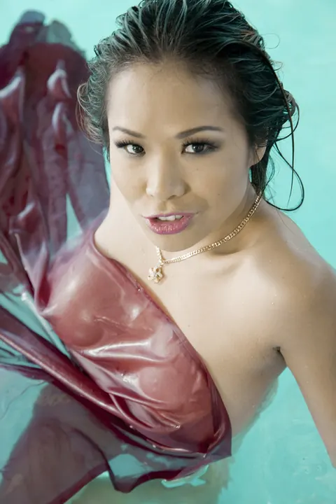 Kim Tao: Asian Brunette with Big Tits Flashes and Spreads by the Pool – photo 6 of 17
