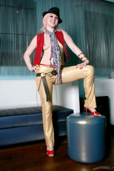 Woman Strips Out of Leather and Spreads – photo 5 of 17